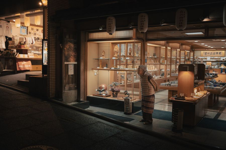 Shopkeeper at Night, Japan